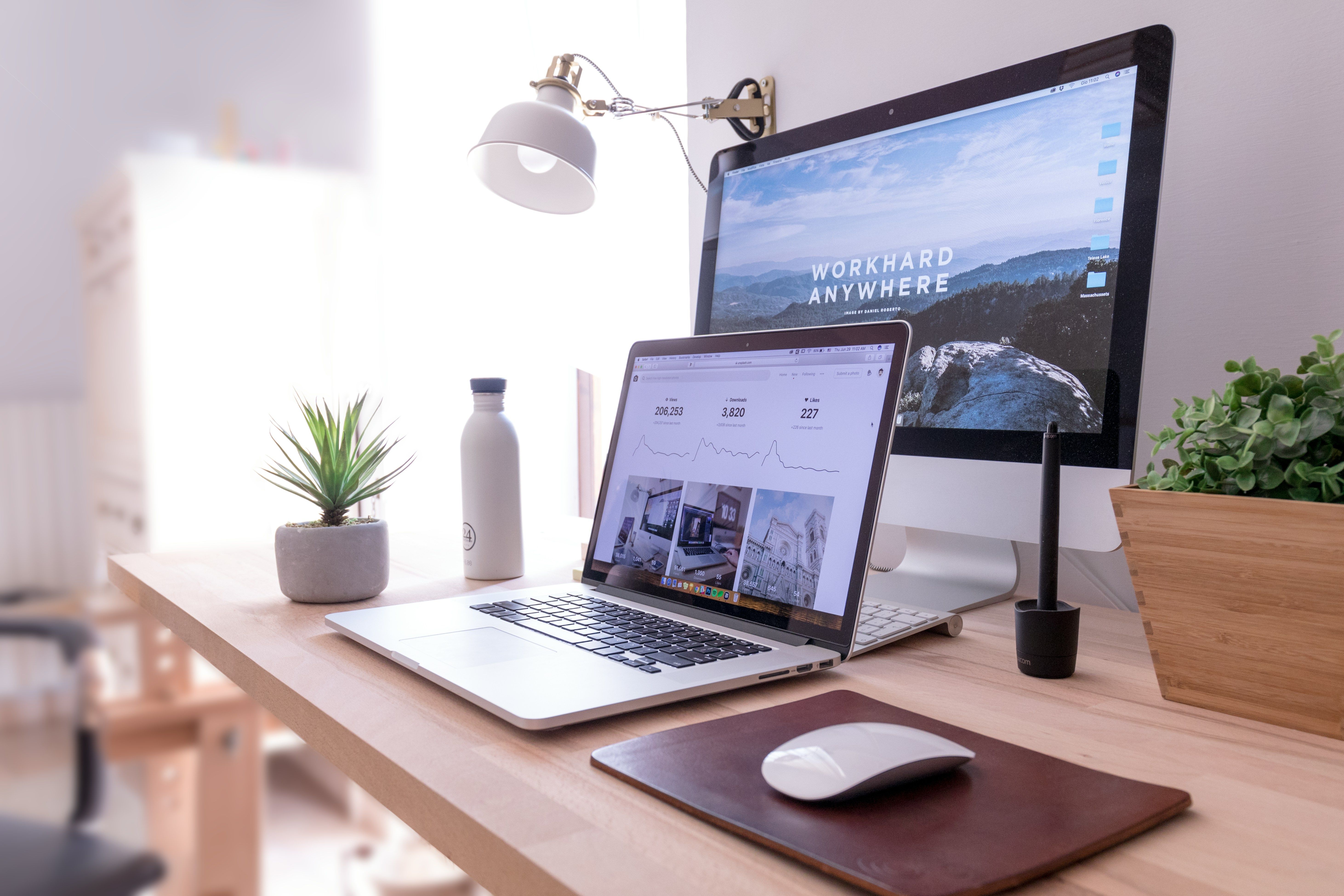 Aerial view of a tidy desk with items laid out.